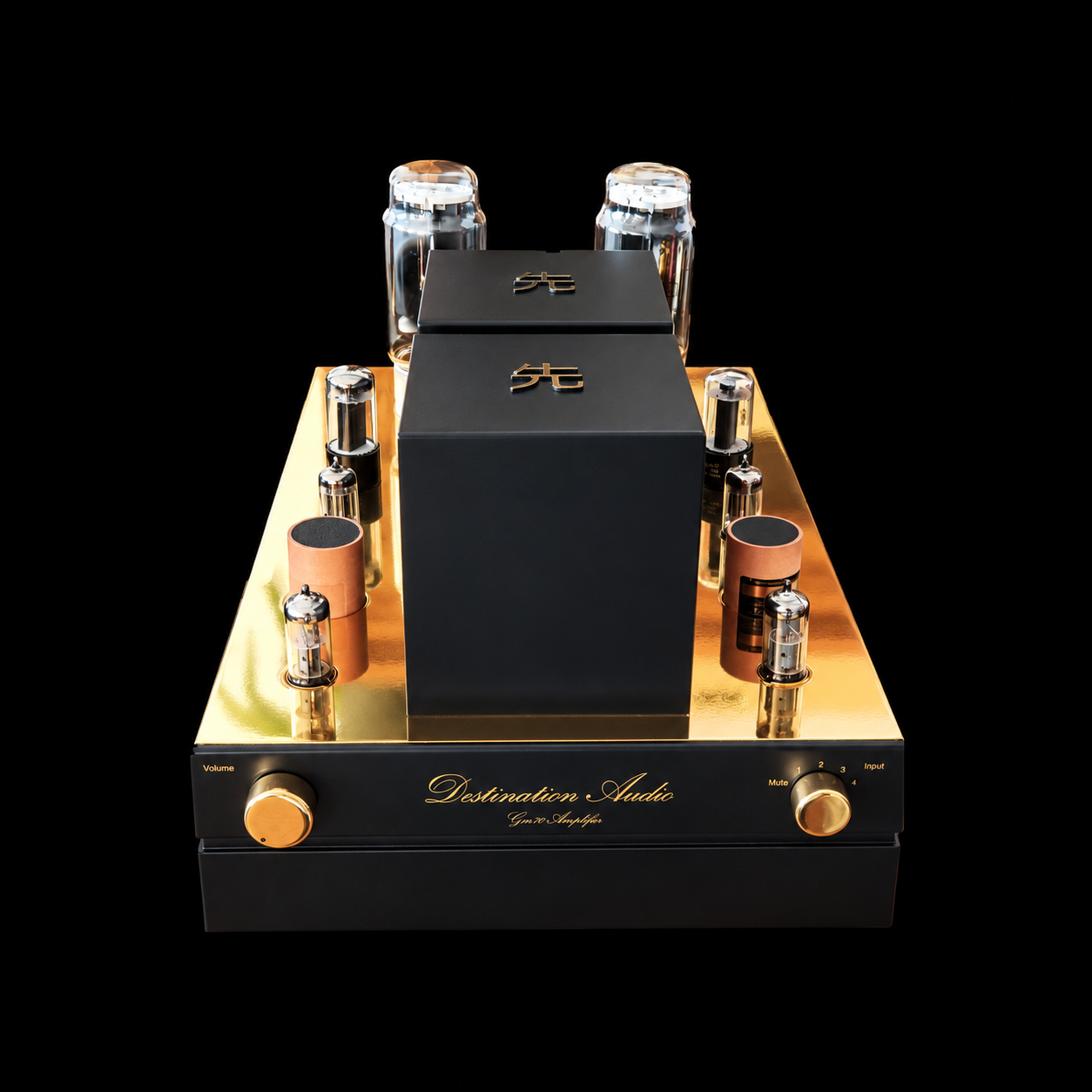 The Destination Audio GM70 integrated amplifier on black, its brass top plate carrying glass tubes around a matte black transformer housing.