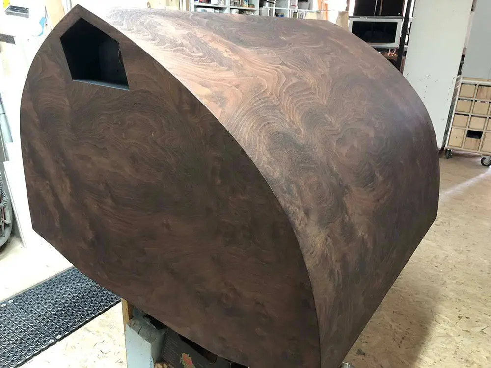 Vista horn loudspeaker finished in figured wood.
