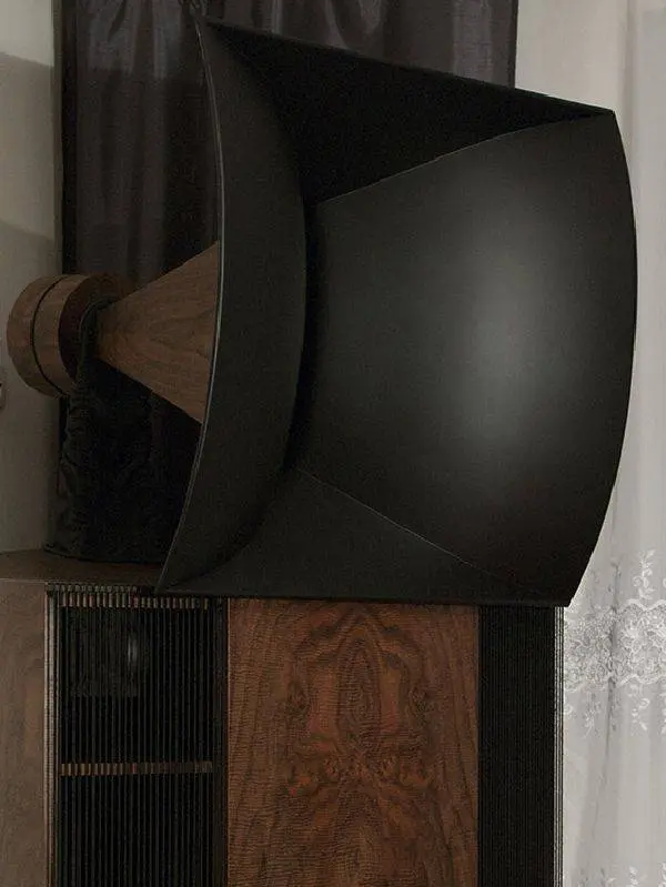 Destination Audio Vista horn speaker with a black horn and walnut cabinet in a living room