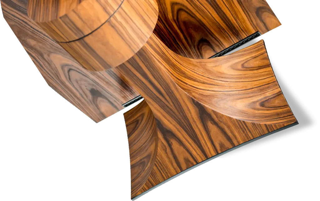 Close-up of the curved rosewood veneer of a Destination Audio horn speaker cabinet